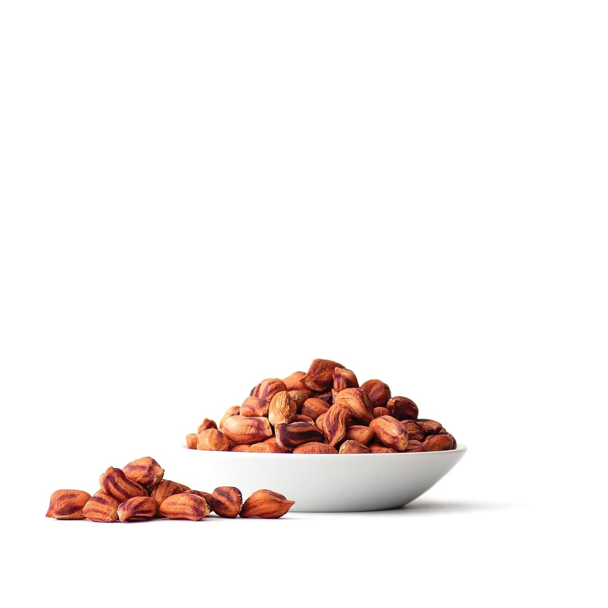 Raw jungle peanuts in a bowl